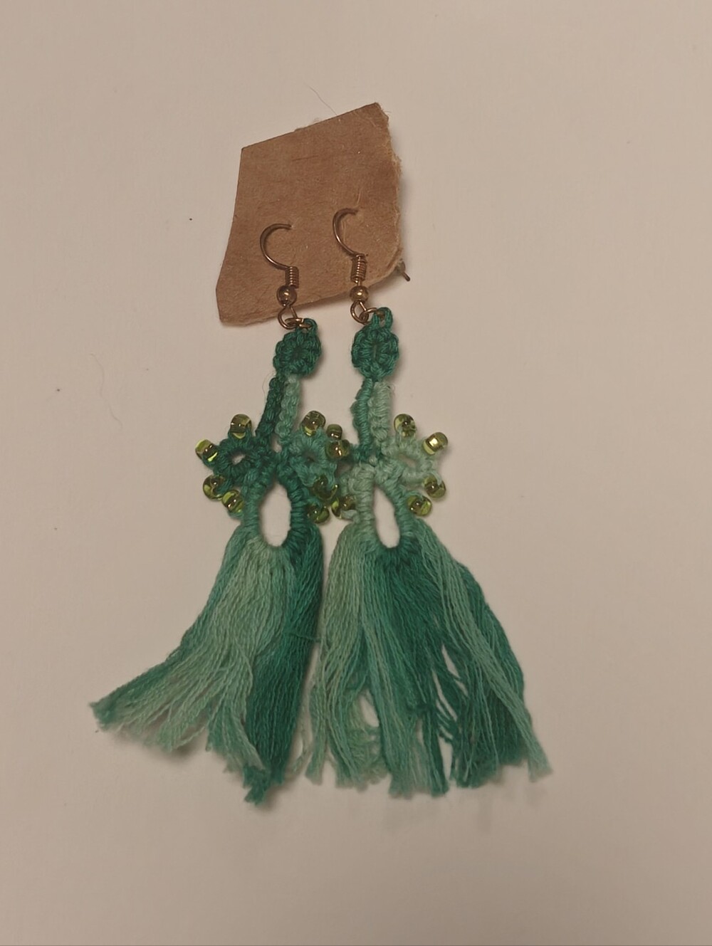 Handmade green shades beaded macrame tassel earrings